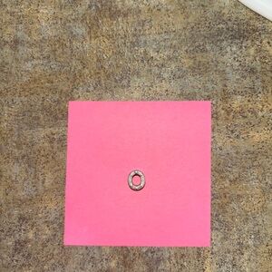 “O” pandora charm.